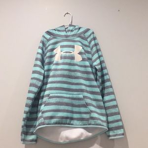 An Under Armour Hoodie in a Youth Large.